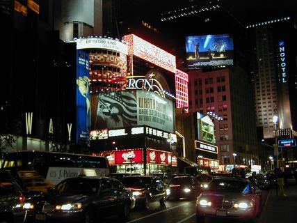 Times Square at night, looking north<br>Location: <a href="https://www.google.com/maps/search/?api=1&query=40.75929,-73.98506" target="_new">West 47th St and Broadway</a>
